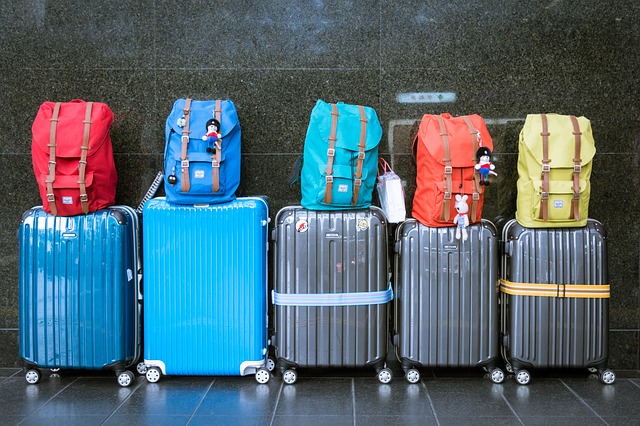 Family with luggage at the airport for winter break travel