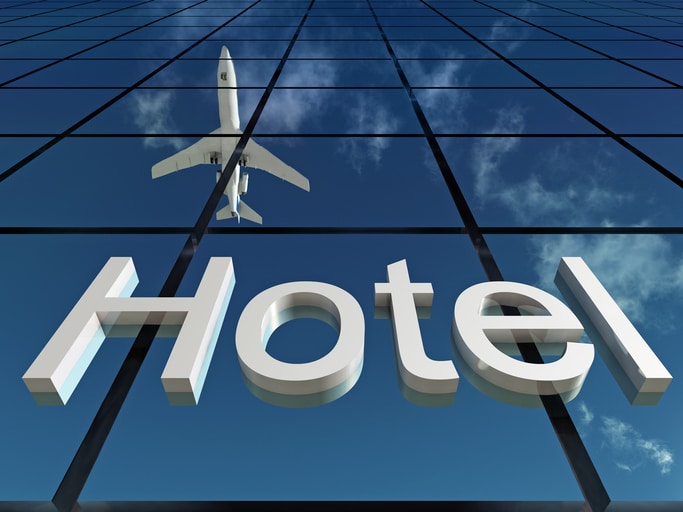 Laguardia hotel sign with plane above