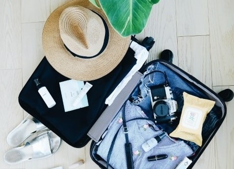 Suitcase packed for travel to the Hamptons