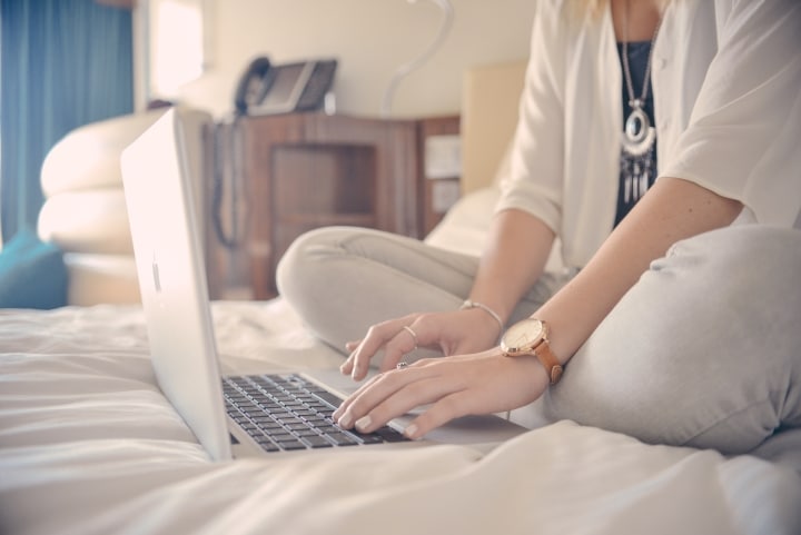 Woman researching LaGuardia airport hotels