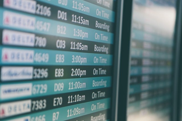 Airport board with arrivals and delays